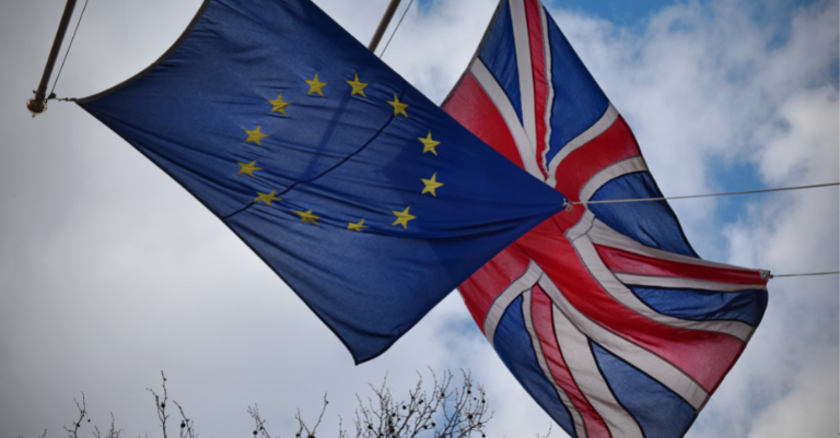 Photo: an EU flag flying next to a Union flag